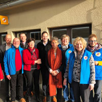 Verkehrsminister Dr. Hans Reichhart mit Ehrenamtlern der Bahnhofsmission Augsburg