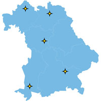 Eine blaue Bayern-Karte. Auf der Karte sind die 5 LANDSTADT-Modellgemeinden in Phase 3 als gelber Stern eingezeichnet. Eine blaue Bayern-Karte. Auf der Karte sind die 5 LANDSTADT-Modellgemeinden in Phase 3 als gelber Stern eingezeichnet.